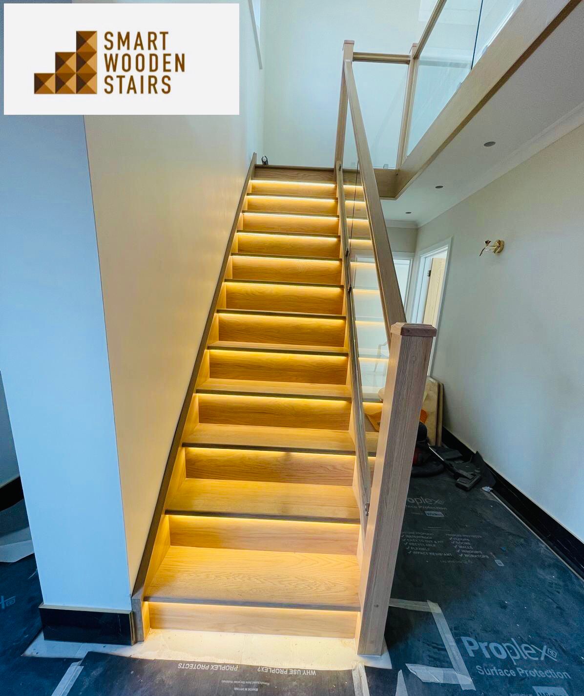 Oak staircase with LED lights and glass